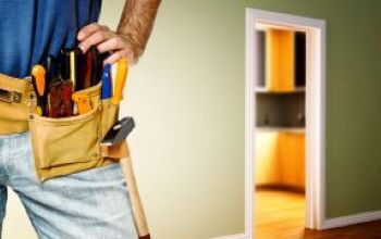 Handyman with tools providing home maintenance services in Tampa & Sarasota